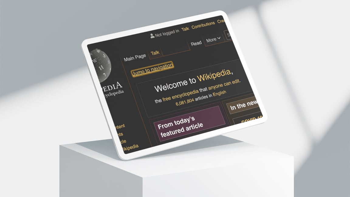 Ipad on a pedestal showing the Wikipedia website with inverted colours and high magnification